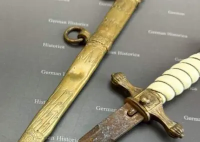 U-Boot-Dolch, Portepee und Kriegsmarine-Abzeichen — Militaria-Sortiment