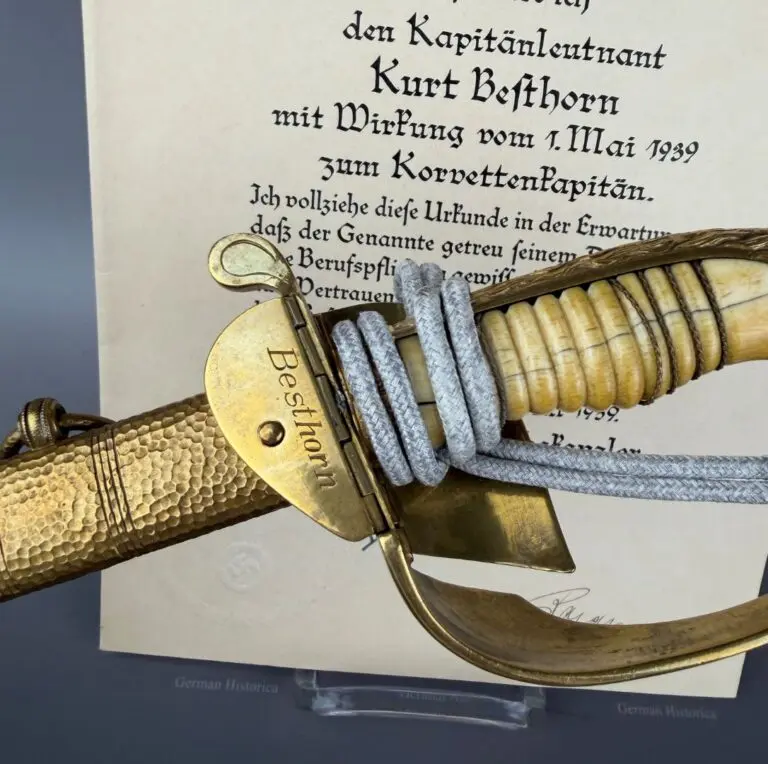 Kaiserlicher Marine Säbel WKC mit Portepee und Beförderungsurkunde — Kurt Besthorn, Kommandant der Seeverteidigung Südjütland und des Abschnitts Sylt